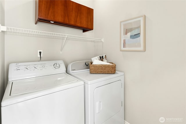 2621 NE Park Dr, Issaquah, WA 98029 - washroom with washing machine and clothes dryer and cabinet space
