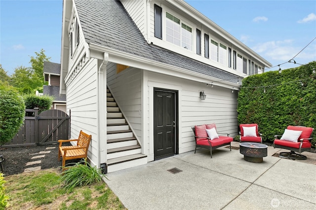 2621 NE Park Dr, Issaquah, WA 98029 - view of patio / terrace featuring an outdoor fire pit and a gate