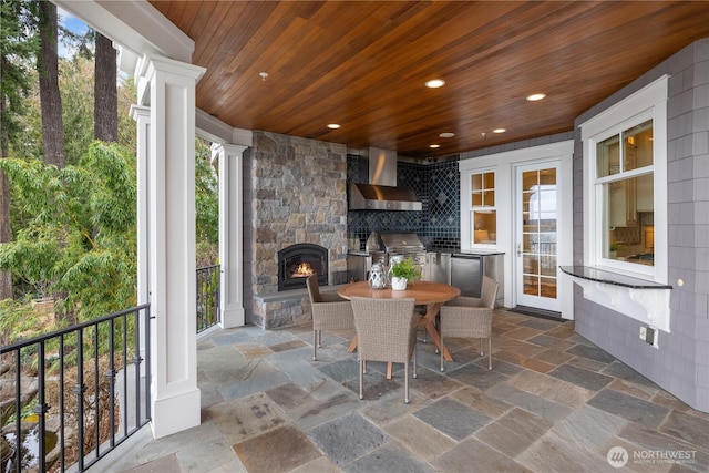 8071 W Mercer Way, Mercer Island, WA 98040 - view of patio / terrace featuring an outdoor kitchen and outdoor dining space