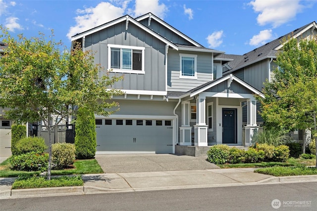 32803 Stuart Ave SE, Black Diamond, WA 98010 - craftsman house with board and batten siding, driveway, and a garage