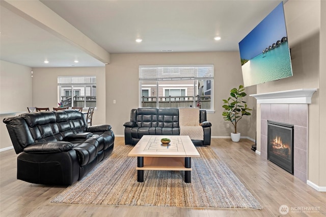 32803 Stuart Ave SE, Black Diamond, WA 98010 - living room featuring light wood-type flooring, recessed lighting, and a fireplace