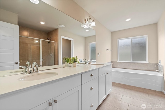 32803 Stuart Ave SE, Black Diamond, WA 98010 - full bath with double vanity, a shower stall, a bath, tile patterned floors, and recessed lighting