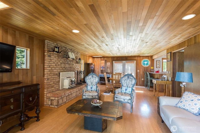 215 Amber Ln, Sequim, WA 98382 - living area featuring wooden ceiling, wood walls, and wood finished floors