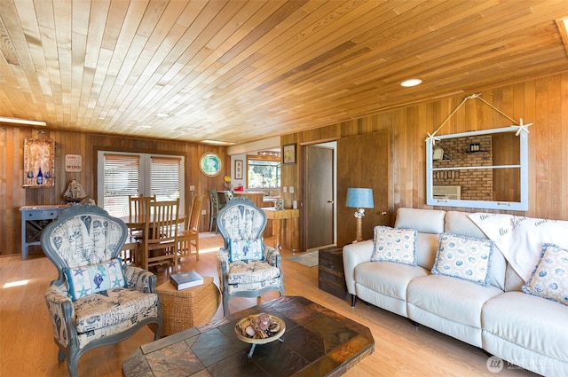 215 Amber Ln, Sequim, WA 98382 - living room with wooden ceiling, wood walls, and wood finished floors