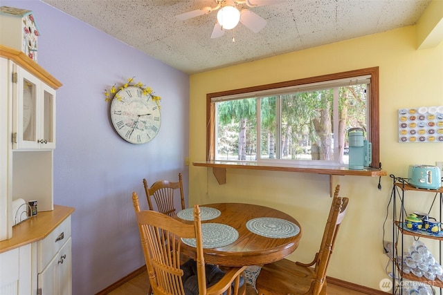 215 Amber Ln, Sequim, WA 98382 - dining area with a ceiling fan and wood finished floors