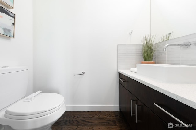 1136 10th Ave E Unit B, Seattle, WA 98102 - half bathroom featuring vanity and wood finished floors