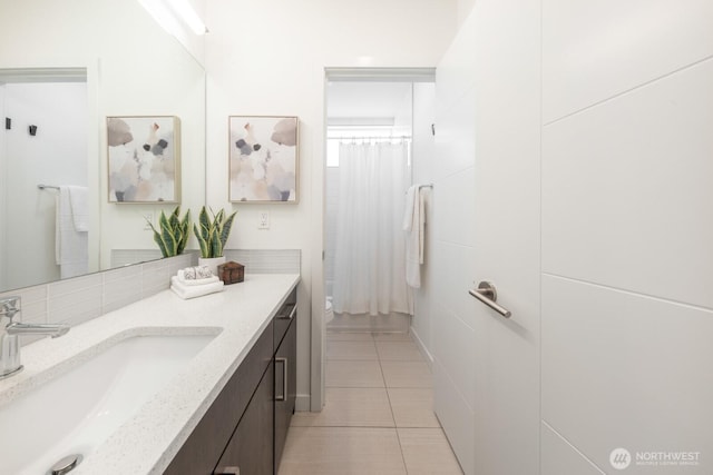 1136 10th Ave E Unit B, Seattle, WA 98102 - bathroom with vanity and tile patterned floors