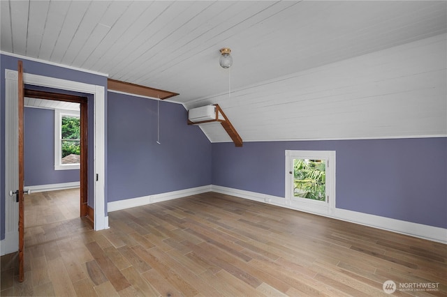 1114 5th Ave SW, Olympia, WA 98502 - bonus room with a wall mounted AC, wood finished floors, wood ceiling, and vaulted ceiling
