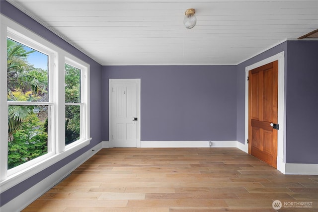 1114 5th Ave SW, Olympia, WA 98502 - empty room featuring light wood-style flooring and baseboards