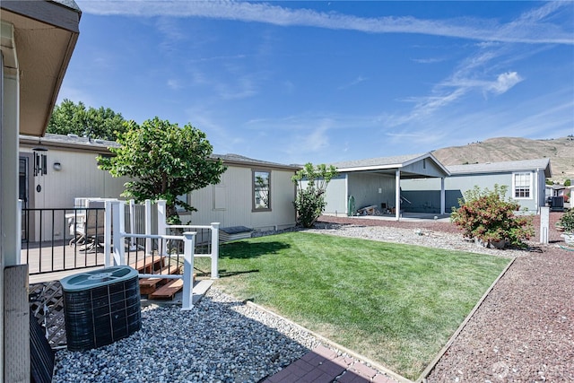 1700 Twin Peaks Dr Unit 71, Wenatchee, WA 98801 - rear view of property with a yard and a deck with mountain view