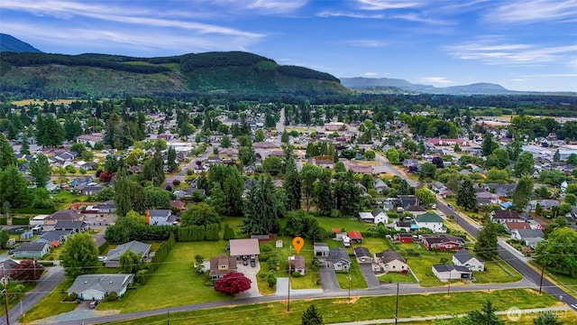 741 Southern Ave, Sedro Woolley, WA 98284 - aerial perspective of suburban area featuring a mountain backdrop