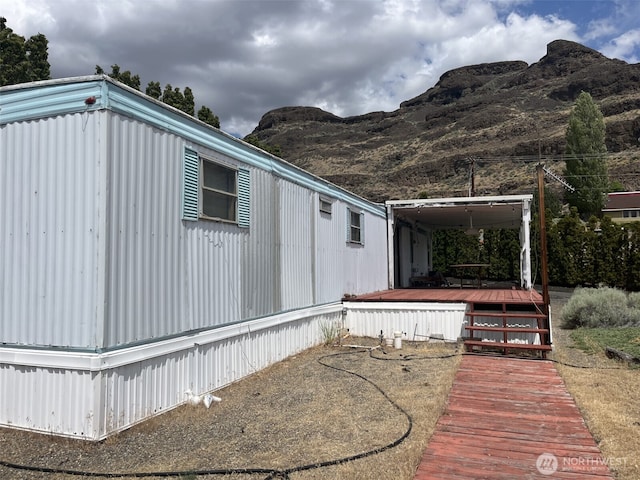 1038 SW Section Ave SW, Quincy, WA 98848 - view of home's exterior featuring a deck with mountain view