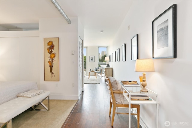530 Broadway E Unit 612, Seattle, WA 98102 - hall with dark wood-style floors and baseboards