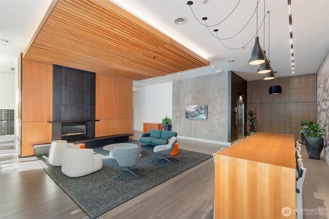 530 Broadway E Unit 612, Seattle, WA 98102 - common area featuring wooden ceiling and wooden walls