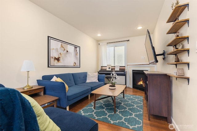 5798 Roosevelt Way NE, Seattle, WA 98105 - living area with wood finished floors, recessed lighting, and a lit fireplace