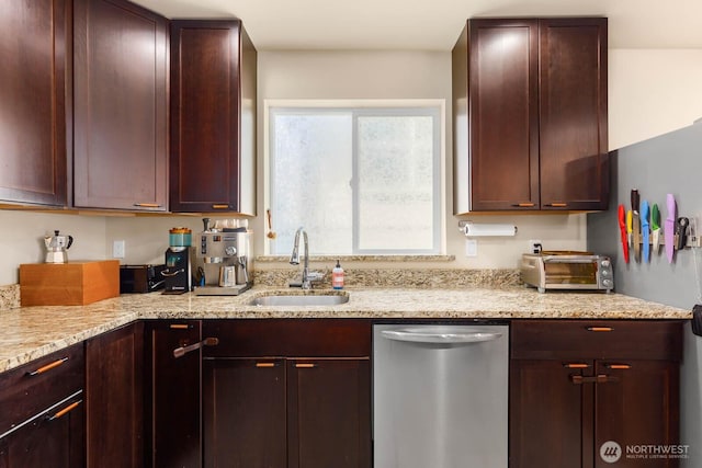 5798 Roosevelt Way NE, Seattle, WA 98105 - kitchen with stainless steel dishwasher and light stone counters