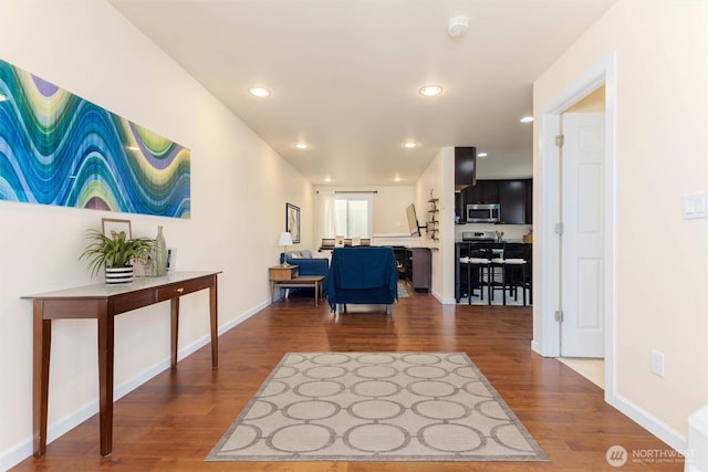 5798 Roosevelt Way NE, Seattle, WA 98105 - living area featuring dark wood-style flooring and recessed lighting