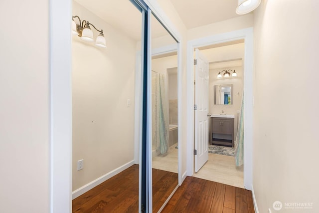 5798 Roosevelt Way NE, Seattle, WA 98105 - hallway featuring dark wood-style flooring and baseboards