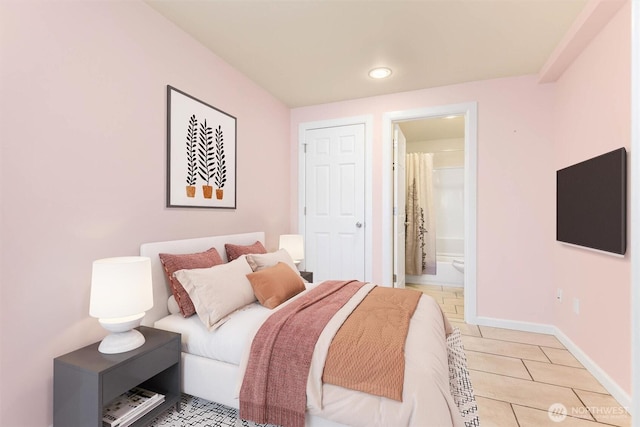 5798 Roosevelt Way NE, Seattle, WA 98105 - bedroom with light tile patterned floors and connected bathroom