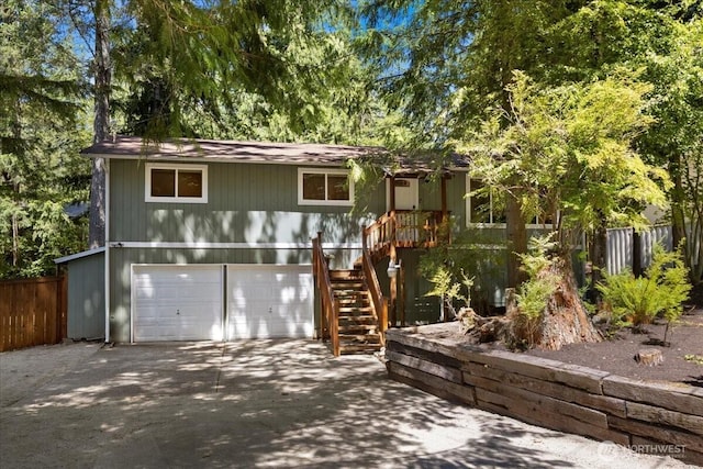 17019 426th Ave SE, North Bend, WA 98045 - view of front of house featuring an attached garage, driveway, and stairway