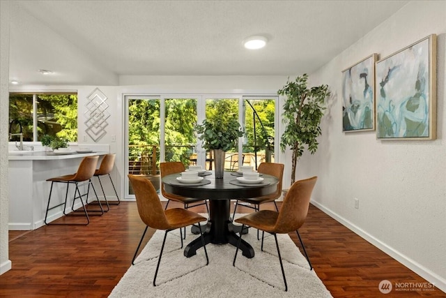 17019 426th Ave SE, North Bend, WA 98045 - dining space featuring wood finished floors and a textured wall