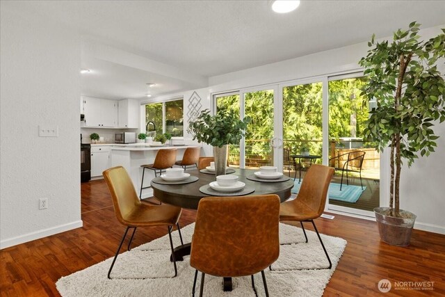 17019 426th Ave SE, North Bend, WA 98045 - dining room with baseboards and dark wood-style floors