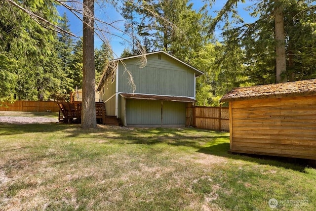 17019 426th Ave SE, North Bend, WA 98045 - view of home's exterior featuring stairs, a fenced backyard, and a shed