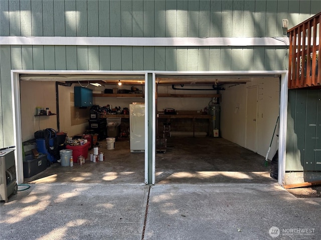17019 426th Ave SE, North Bend, WA 98045 - garage featuring freestanding refrigerator and driveway