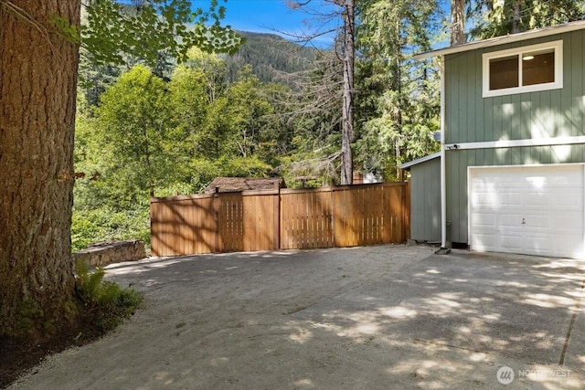 17019 426th Ave SE, North Bend, WA 98045 - view of home's exterior featuring an attached garage and driveway