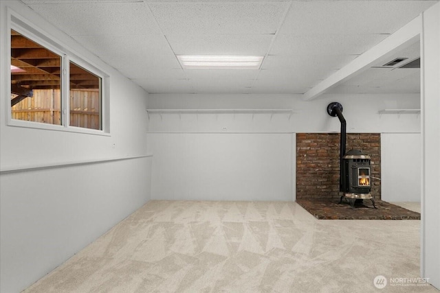 17019 426th Ave SE, North Bend, WA 98045 - finished basement featuring carpet flooring and a wood stove