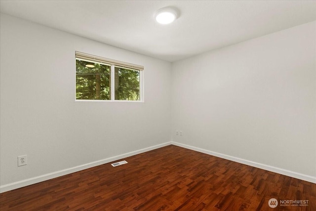17019 426th Ave SE, North Bend, WA 98045 - empty room featuring baseboards and wood finished floors