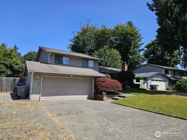 10924 SE 183rd Ct, Renton, WA 98055 - split level home with concrete driveway and an attached garage