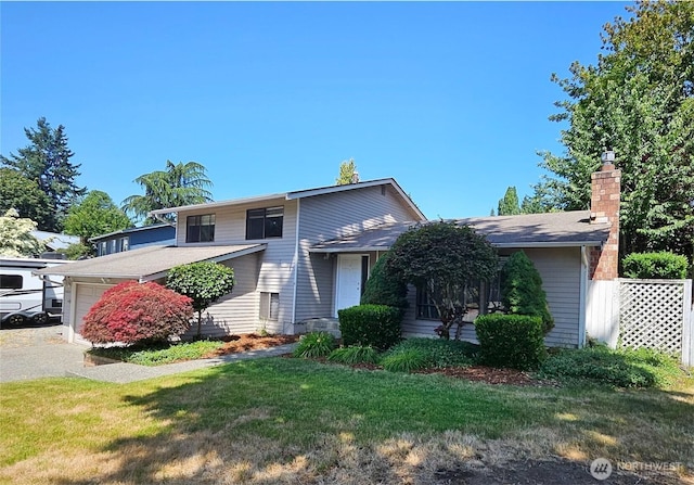 10924 SE 183rd Ct, Renton, WA 98055 - view of front of house with a garage, a chimney, and a front yard