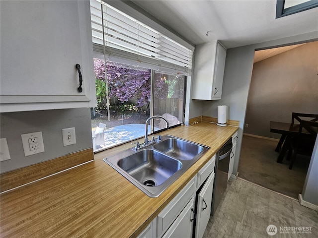 10924 SE 183rd Ct, Renton, WA 98055 - kitchen featuring stainless steel dishwasher and white cabinets