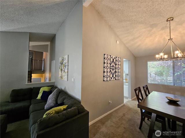 10924 SE 183rd Ct, Renton, WA 98055 - dining area featuring a textured ceiling, a chandelier, vaulted ceiling, and carpet floors