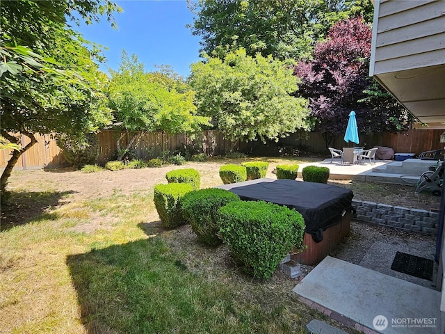 10924 SE 183rd Ct, Renton, WA 98055 - fenced backyard featuring a patio and a hot tub