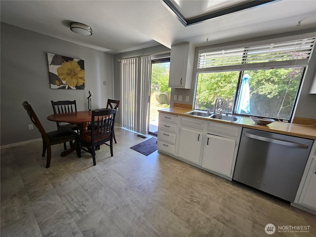 10924 SE 183rd Ct, Renton, WA 98055 - kitchen with dishwasher, light flooring, wooden counters, and white cabinets