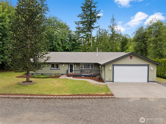 7207 Lakeside St SW, Olympia, WA 98512 - ranch-style house with an attached garage, a front yard, concrete driveway, and covered porch