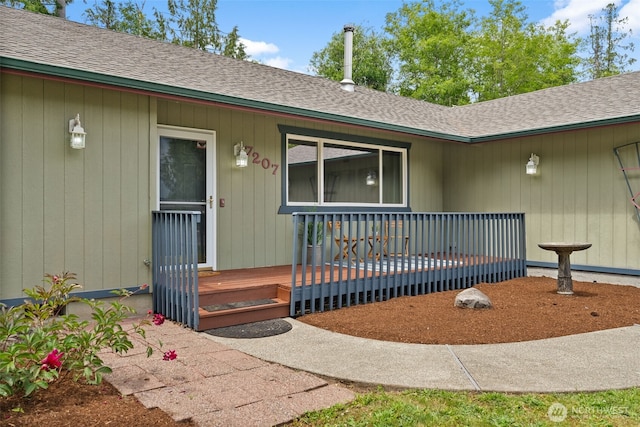 7207 Lakeside St SW, Olympia, WA 98512 - view of exterior entry featuring a shingled roof and a deck