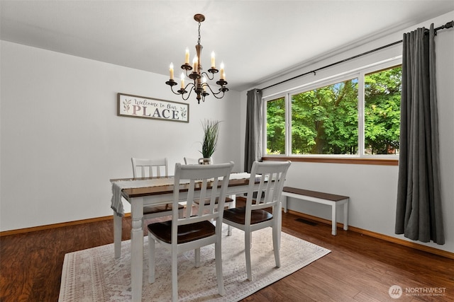 7207 Lakeside St SW, Olympia, WA 98512 - dining room featuring a chandelier and wood finished floors