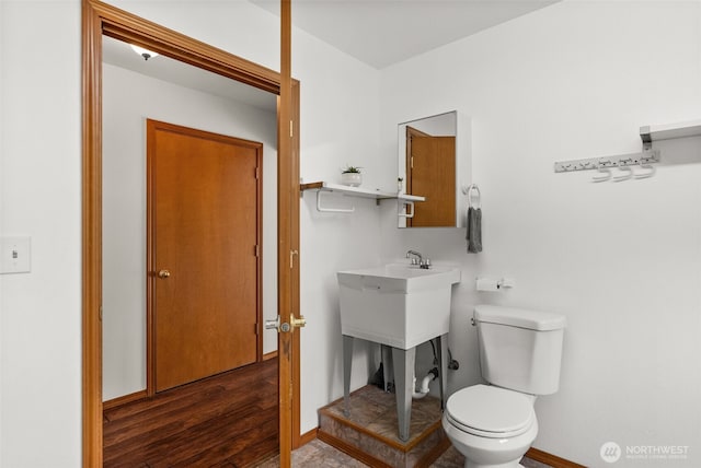 7207 Lakeside St SW, Olympia, WA 98512 - half bath featuring toilet and wood finished floors