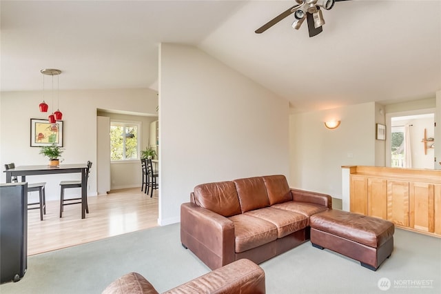 2217 W Birch, Bellingham, WA 98229 - living area with vaulted ceiling, a ceiling fan, and carpet flooring