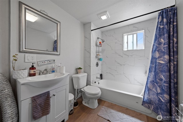 755 S Chelan Ave, Wenatchee, WA 98801 - bathroom featuring wood finished floors, shower / tub combo, and vanity