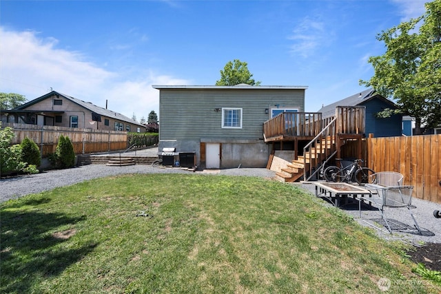 755 S Chelan Ave, Wenatchee, WA 98801 - rear view of house with stairway and a wooden deck