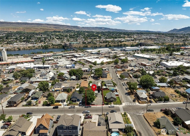 755 S Chelan Ave, Wenatchee, WA 98801 - aerial overview of property's location featuring a water and mountain view, nearby suburban area, and a notable bridge