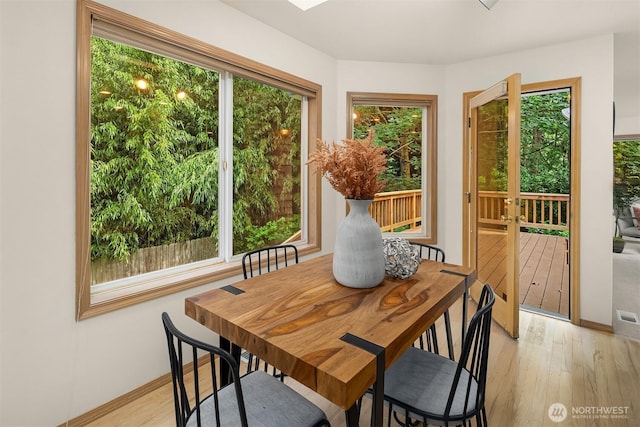 11926 SE 198th Ct, Kent, WA 98031 - dining room with plenty of natural light and light wood-type flooring