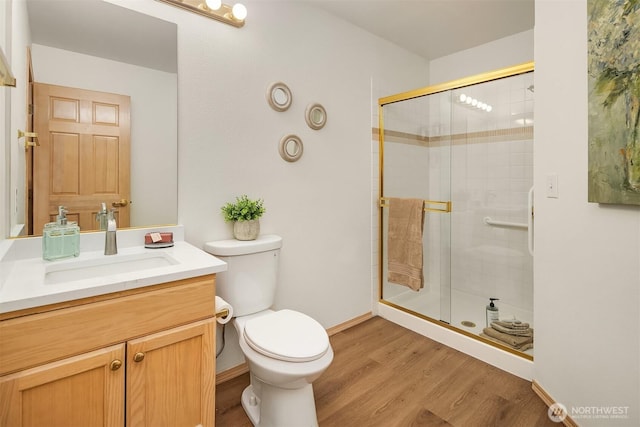 11926 SE 198th Ct, Kent, WA 98031 - bathroom featuring vanity, a shower stall, and wood finished floors