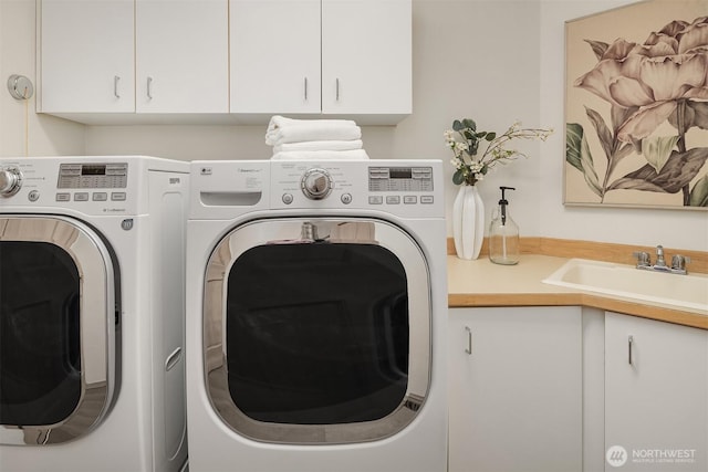 11926 SE 198th Ct, Kent, WA 98031 - laundry room featuring washing machine and dryer and cabinet space