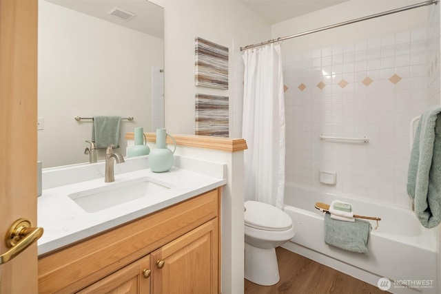 11926 SE 198th Ct, Kent, WA 98031 - bathroom with vanity, shower / tub combo, and wood finished floors