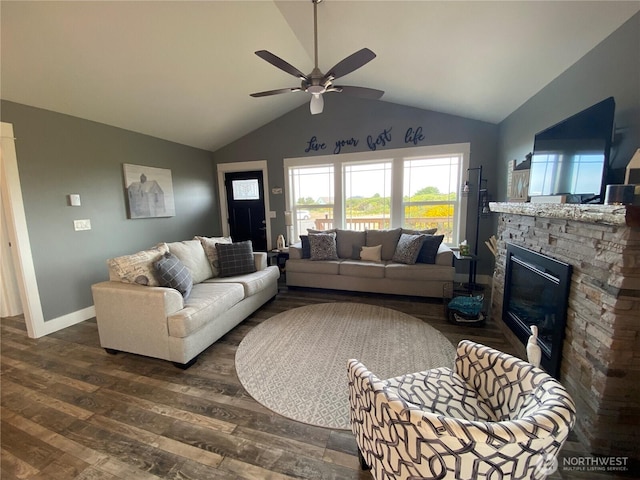 1111 Riverside Ct, Ocean Shores, WA 98569 - living area with dark wood-style flooring, vaulted ceiling, a ceiling fan, and a fireplace